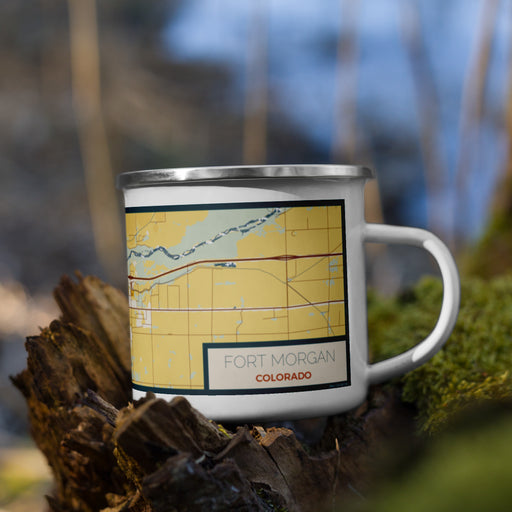 Right View Custom Fort Morgan Colorado Map Enamel Mug in Woodblock on Grass With Trees in Background