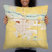Person holding 22x22 Custom Fort Morgan Colorado Map Throw Pillow in Woodblock