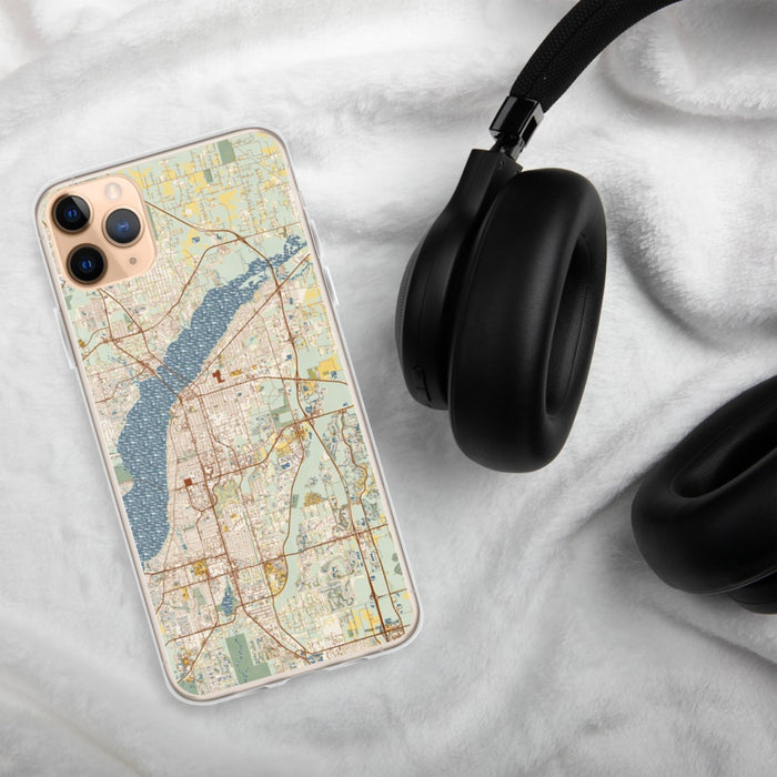Custom Fort Myers Florida Map Phone Case in Woodblock on Table with Black Headphones