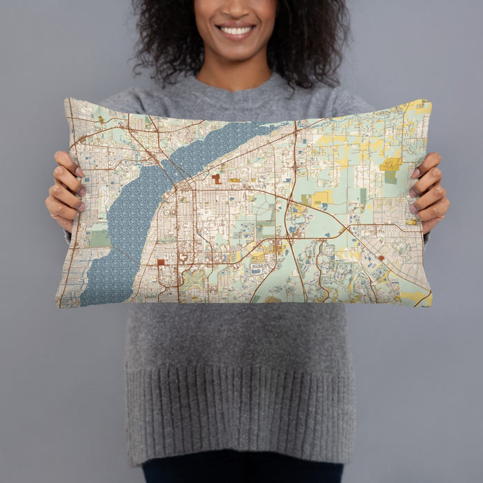 Person holding 20x12 Custom Fort Myers Florida Map Throw Pillow in Woodblock