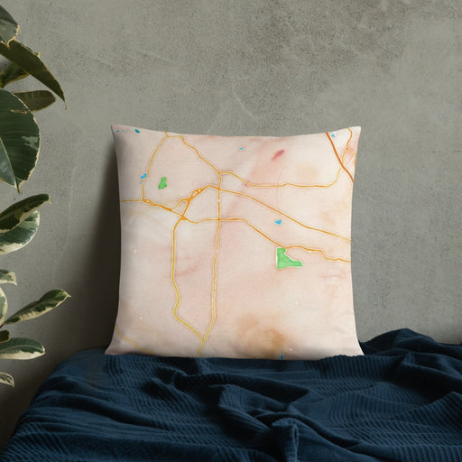 Custom Fort Oglethorpe Georgia Map Throw Pillow in Watercolor on Bedding Against Wall