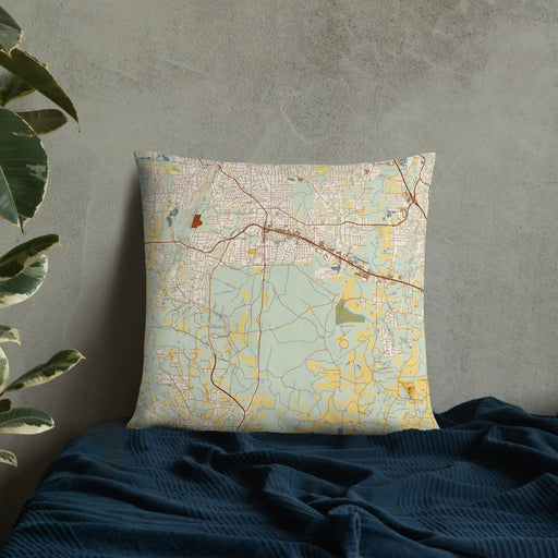 Custom Fort Oglethorpe Georgia Map Throw Pillow in Woodblock on Bedding Against Wall
