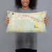 Person holding 20x12 Custom Fort Oglethorpe Georgia Map Throw Pillow in Woodblock