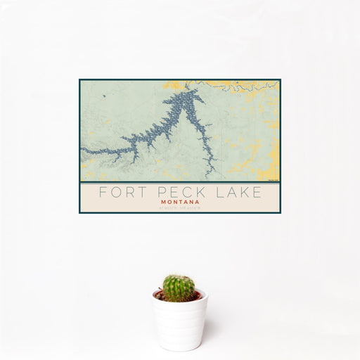 12x18 Fort Peck Lake Montana Map Print Landscape Orientation in Woodblock Style With Small Cactus Plant in White Planter