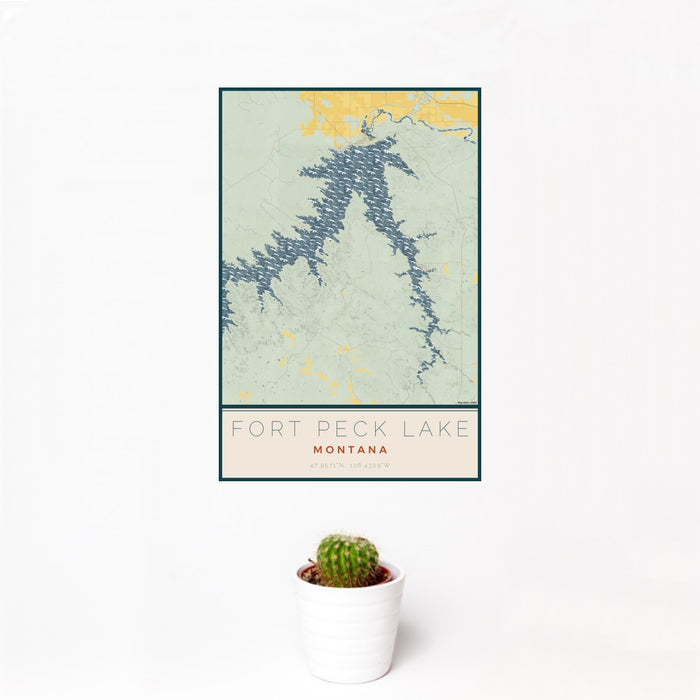 12x18 Fort Peck Lake Montana Map Print Portrait Orientation in Woodblock Style With Small Cactus Plant in White Planter