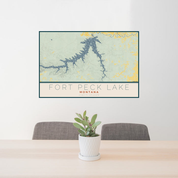 24x36 Fort Peck Lake Montana Map Print Lanscape Orientation in Woodblock Style Behind 2 Chairs Table and Potted Plant