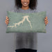 Person holding 20x12 Custom Fort Peck Lake Montana Map Throw Pillow in Afternoon