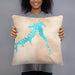 Person holding 18x18 Custom Fort Peck Lake Montana Map Throw Pillow in Watercolor