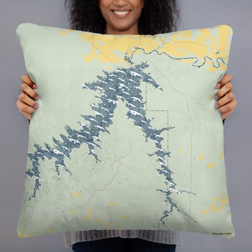 Person holding 22x22 Custom Fort Peck Lake Montana Map Throw Pillow in Woodblock