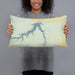 Person holding 20x12 Custom Fort Peck Lake Montana Map Throw Pillow in Woodblock