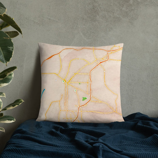 Custom Fort Smith Arkansas Map Throw Pillow in Watercolor on Bedding Against Wall