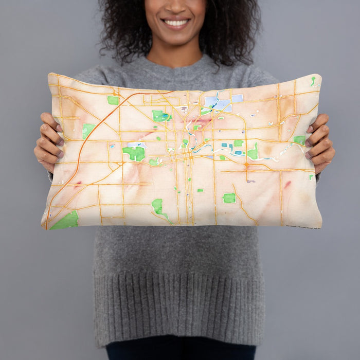 Person holding 20x12 Custom Fort Wayne Indiana Map Throw Pillow in Watercolor