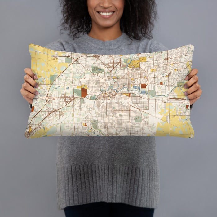 Person holding 20x12 Custom Fort Wayne Indiana Map Throw Pillow in Woodblock