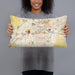 Person holding 20x12 Custom Fort Wayne Indiana Map Throw Pillow in Woodblock