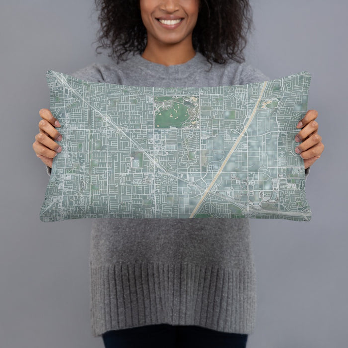 Person holding 20x12 Custom Fountain Valley California Map Throw Pillow in Afternoon