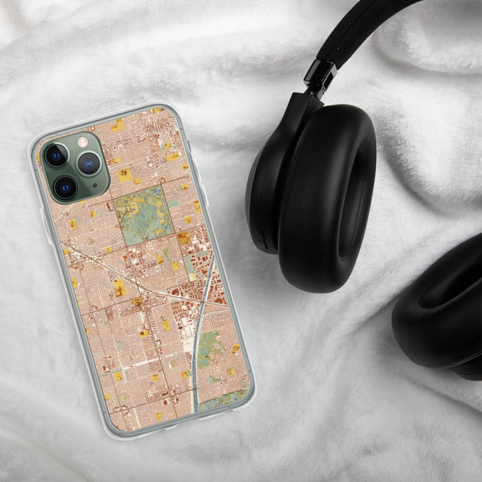 Custom Fountain Valley California Map Phone Case in Woodblock on Table with Black Headphones