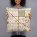 Person holding 18x18 Custom Fountain Valley California Map Throw Pillow in Woodblock