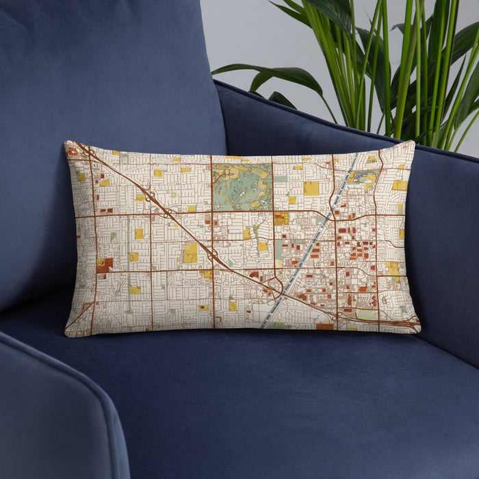 Custom Fountain Valley California Map Throw Pillow in Woodblock on Blue Colored Chair