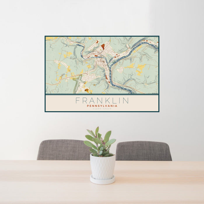 24x36 Franklin Pennsylvania Map Print Lanscape Orientation in Woodblock Style Behind 2 Chairs Table and Potted Plant