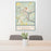 24x36 Franklin Pennsylvania Map Print Portrait Orientation in Woodblock Style Behind 2 Chairs Table and Potted Plant