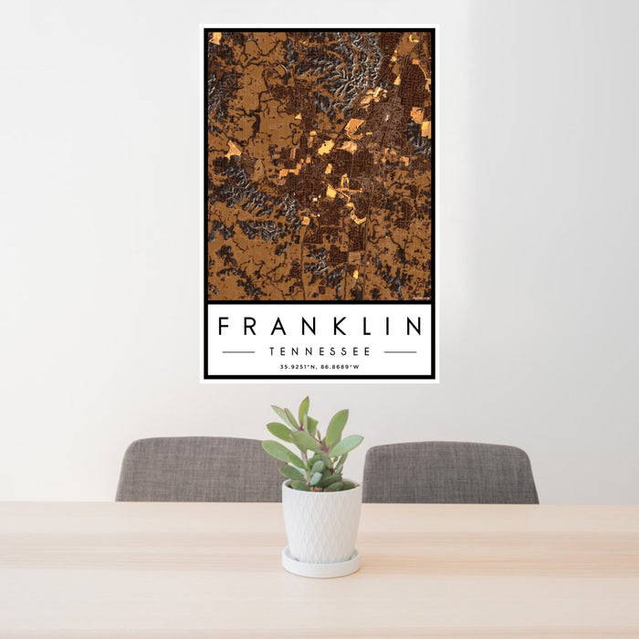 24x36 Franklin Tennessee Map Print Portrait Orientation in Ember Style Behind 2 Chairs Table and Potted Plant