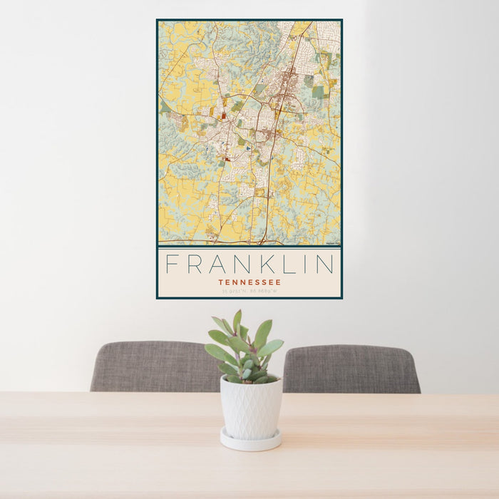 24x36 Franklin Tennessee Map Print Portrait Orientation in Woodblock Style Behind 2 Chairs Table and Potted Plant