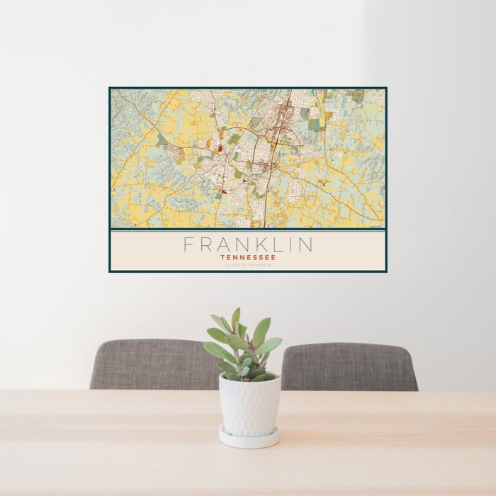 24x36 Franklin Tennessee Map Print Landscape Orientation in Woodblock Style Behind 2 Chairs Table and Potted Plant