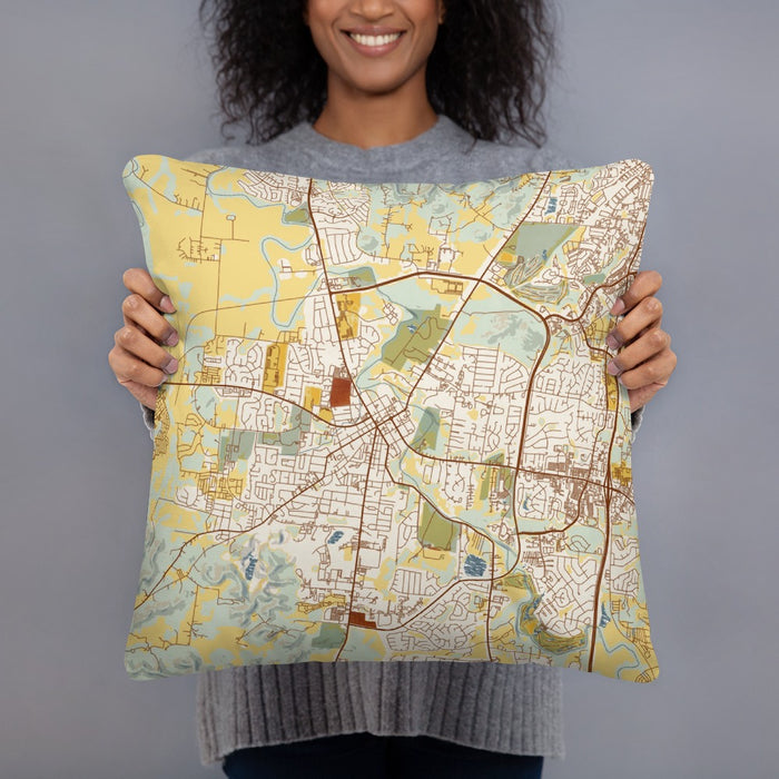Person holding 18x18 Custom Franklin Tennessee Map Throw Pillow in Woodblock