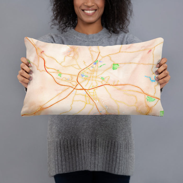 Person holding 20x12 Custom Frederick Maryland Map Throw Pillow in Watercolor