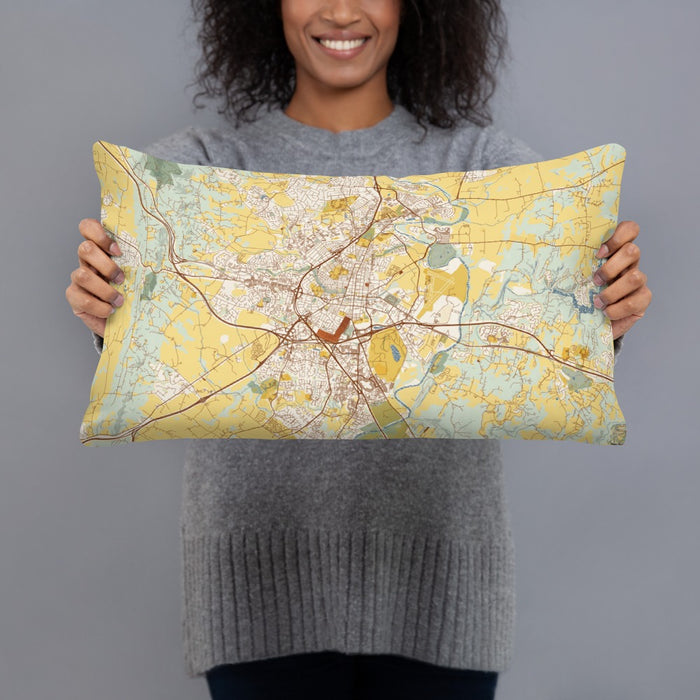 Person holding 20x12 Custom Frederick Maryland Map Throw Pillow in Woodblock