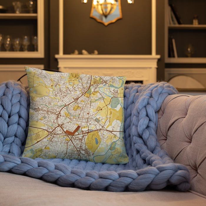 Custom Frederick Maryland Map Throw Pillow in Woodblock on Cream Colored Couch