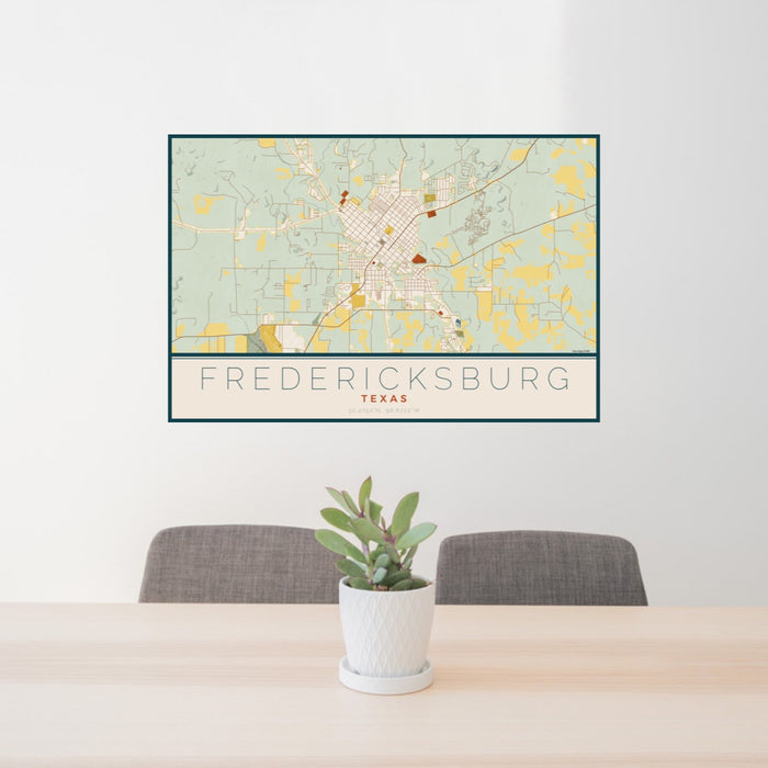 24x36 Fredericksburg Texas Map Print Lanscape Orientation in Woodblock Style Behind 2 Chairs Table and Potted Plant