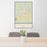 24x36 Fredericksburg Texas Map Print Portrait Orientation in Woodblock Style Behind 2 Chairs Table and Potted Plant