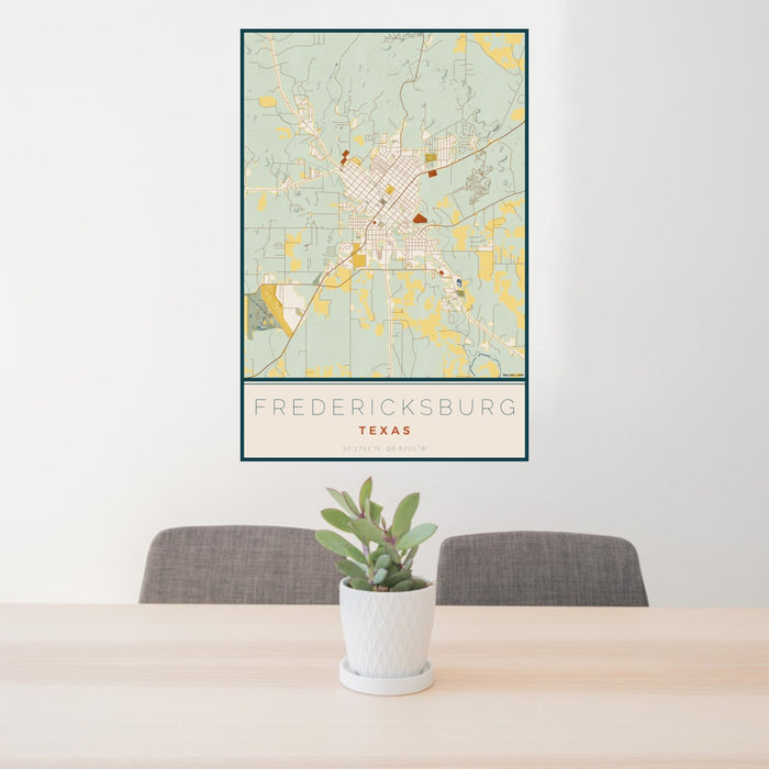 24x36 Fredericksburg Texas Map Print Portrait Orientation in Woodblock Style Behind 2 Chairs Table and Potted Plant