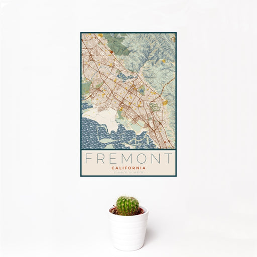 12x18 Fremont California Map Print Portrait Orientation in Woodblock Style With Small Cactus Plant in White Planter