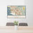 24x36 Fremont California Map Print Landscape Orientation in Woodblock Style Behind 2 Chairs Table and Potted Plant
