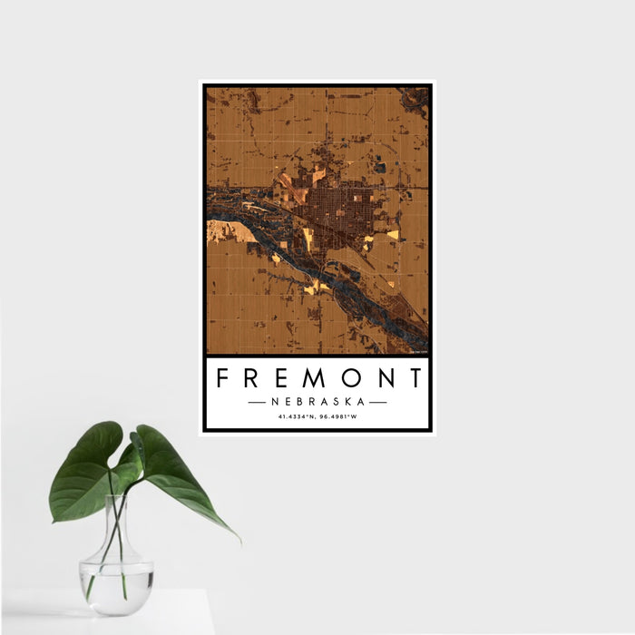 16x24 Fremont Nebraska Map Print Portrait Orientation in Ember Style With Tropical Plant Leaves in Water