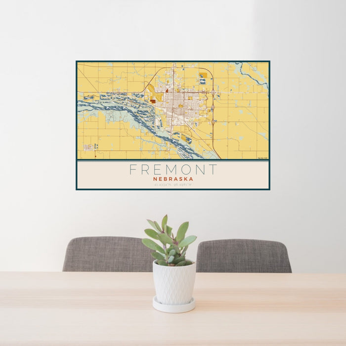 24x36 Fremont Nebraska Map Print Lanscape Orientation in Woodblock Style Behind 2 Chairs Table and Potted Plant