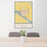 24x36 Fremont Nebraska Map Print Portrait Orientation in Woodblock Style Behind 2 Chairs Table and Potted Plant
