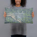 Person holding 20x12 Custom Fremont Nebraska Map Throw Pillow in Afternoon