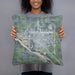 Person holding 18x18 Custom Fremont Nebraska Map Throw Pillow in Afternoon
