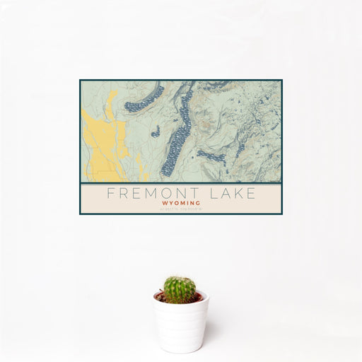 12x18 Fremont Lake Wyoming Map Print Landscape Orientation in Woodblock Style With Small Cactus Plant in White Planter