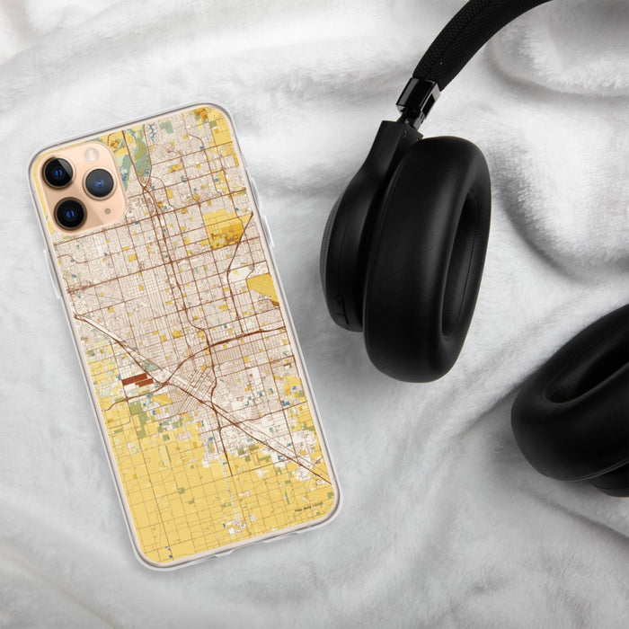 Custom Fresno California Map Phone Case in Woodblock on Table with Black Headphones