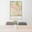 24x36 Friendswood Texas Map Print Portrait Orientation in Woodblock Style Behind 2 Chairs Table and Potted Plant