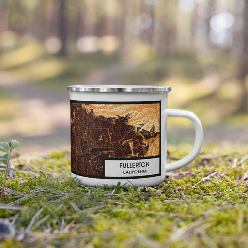 Right View Custom Fullerton California Map Enamel Mug in Ember on Grass With Trees in Background