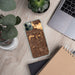 Custom Fullerton California Map Phone Case in Ember on Table with Laptop and Plant