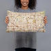 Person holding 20x12 Custom Fullerton California Map Throw Pillow in Woodblock
