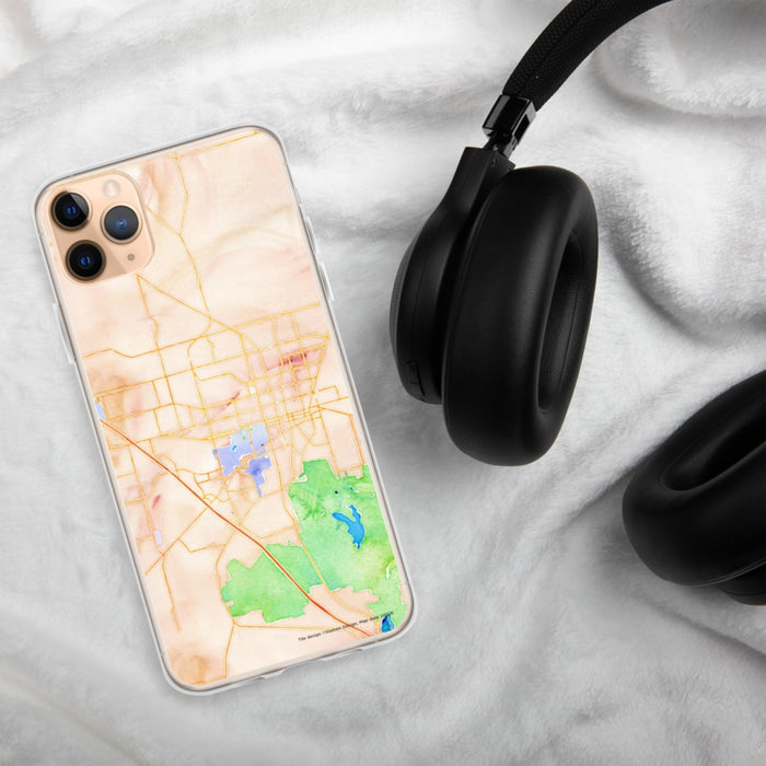 Custom Gainesville Florida Map Phone Case in Watercolor on Table with Black Headphones