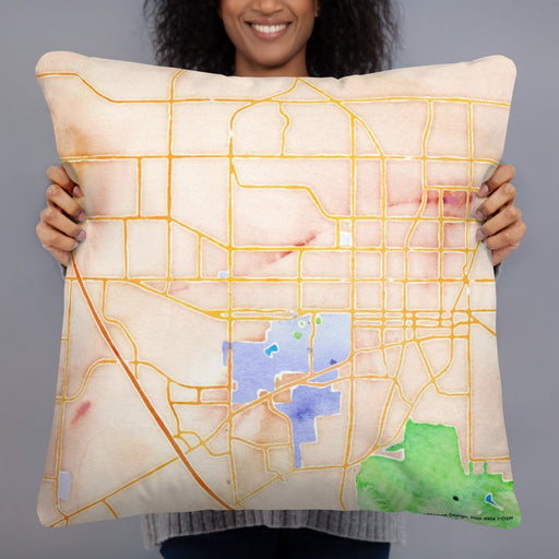 Person holding 22x22 Custom Gainesville Florida Map Throw Pillow in Watercolor