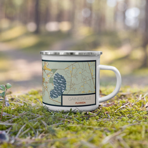 Right View Custom Gainesville Florida Map Enamel Mug in Woodblock on Grass With Trees in Background